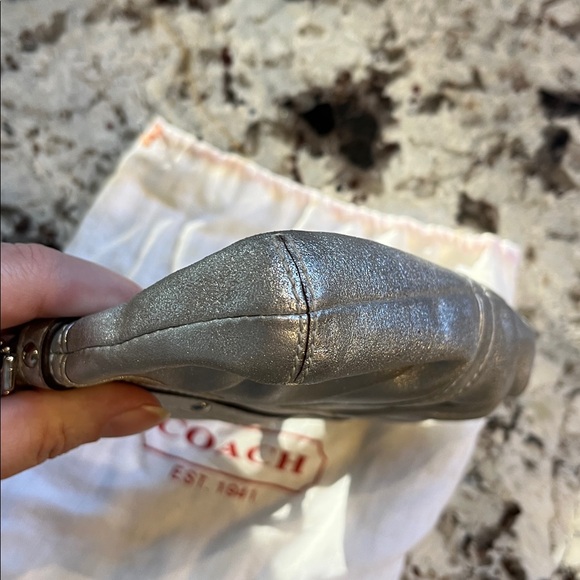 Coach Silver leather wristlet. Pre-Owned Condition-Very Good. - Picture 7 of 9